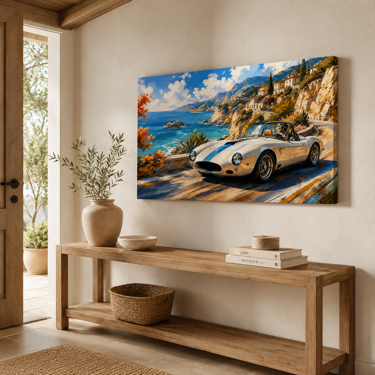 Azure Coast Mediterranean car artwork displayed above a light wood entryway console