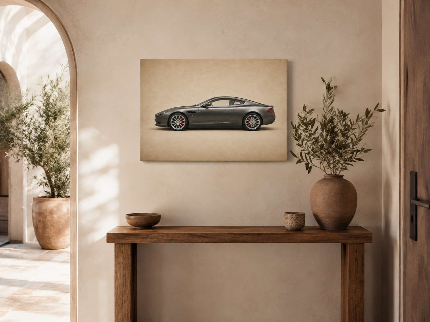 Graphite Grand Tour minimalist coupe wall art displayed above a rustic entryway console