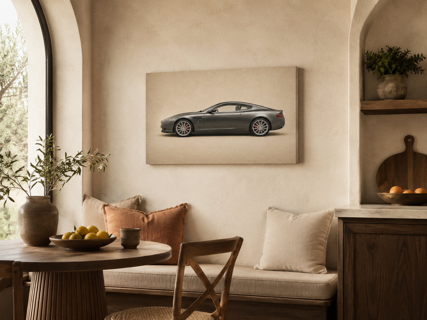 Graphite Grand Tour grey sports coupe wall art displayed in a warm Mediterranean dining corner